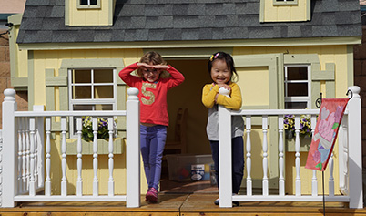 Preschoolers on Playhouse Front Porch